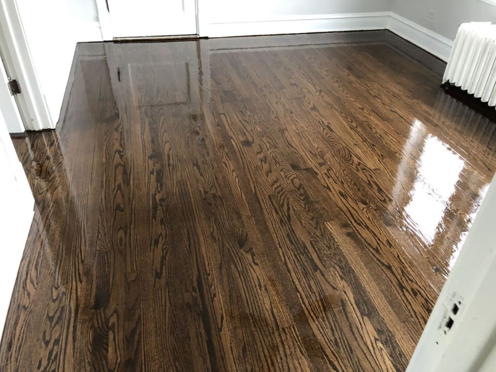 Refinishing of red oak floor, stained Espresso Duraseal and finished with 2...