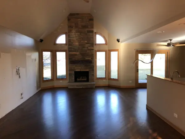 Light stained hardwood floors with satin sheen – North Shore Chicago | FLOORecki Light stained hardwood flooring with a satin finish in a North Shore Chicago home