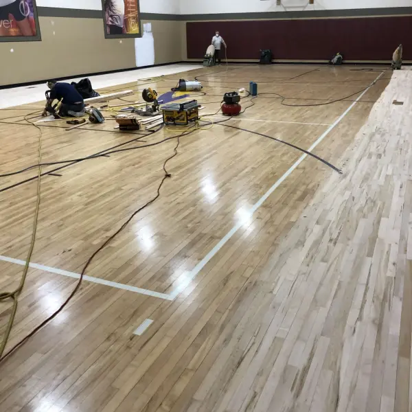 Commercial basketball court water damage hardwood replacement Chicago