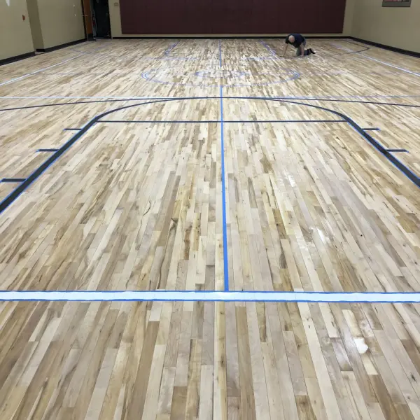 Basketball court line painting game lines before Chicago commercial gym FLOORecki