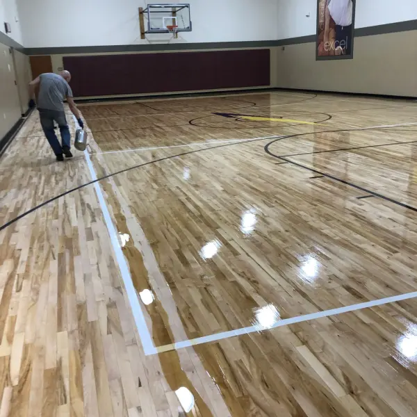 LA Fitness Chicago basketball court floor detail after professional refinishing — FLOORecki contractor 