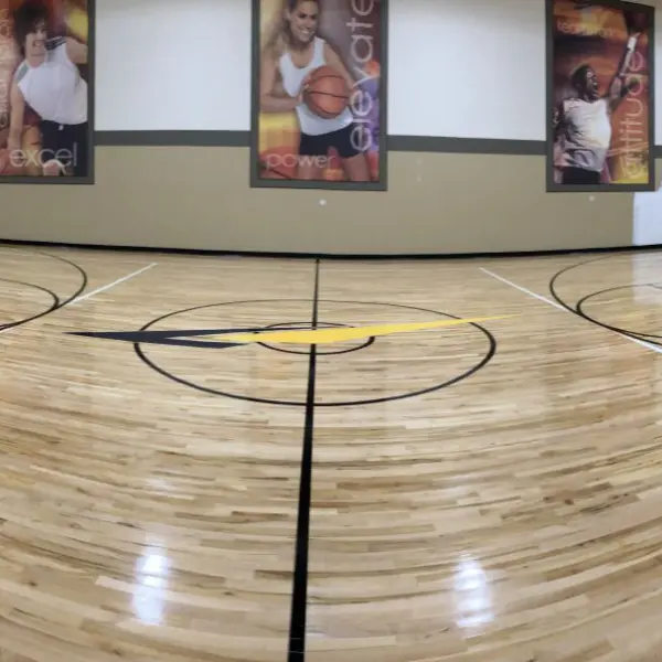 Panoramic view LA Fitness gym hardwood basketball court after refinishing Chicago — FLOORecki Floors 