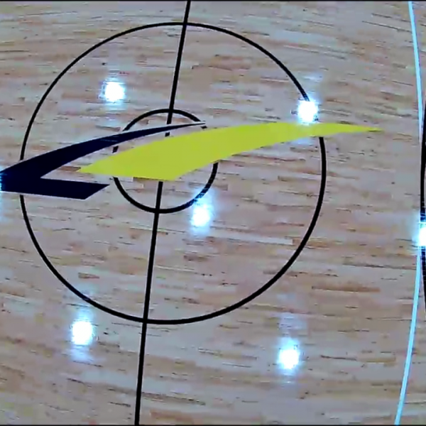 Completed LA Fitness basketball court hardwood floor restoration Chicago logo