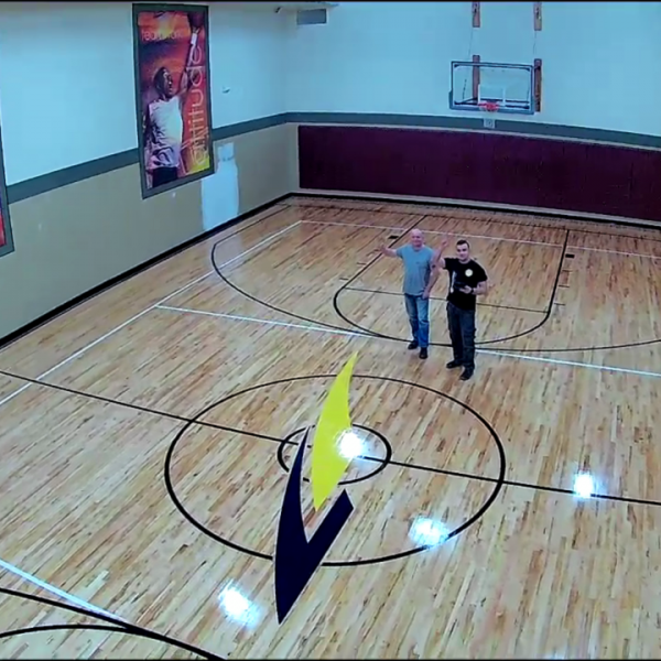 Commercial basketball court water damage hardwood replacement Chicago technician