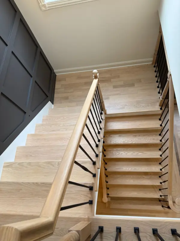White Oak Staircase Refinishing with Black Iron Spindles | FLOORecki Floors and Stairs Stair Installation refinishing chicago floorecki flooring spindles