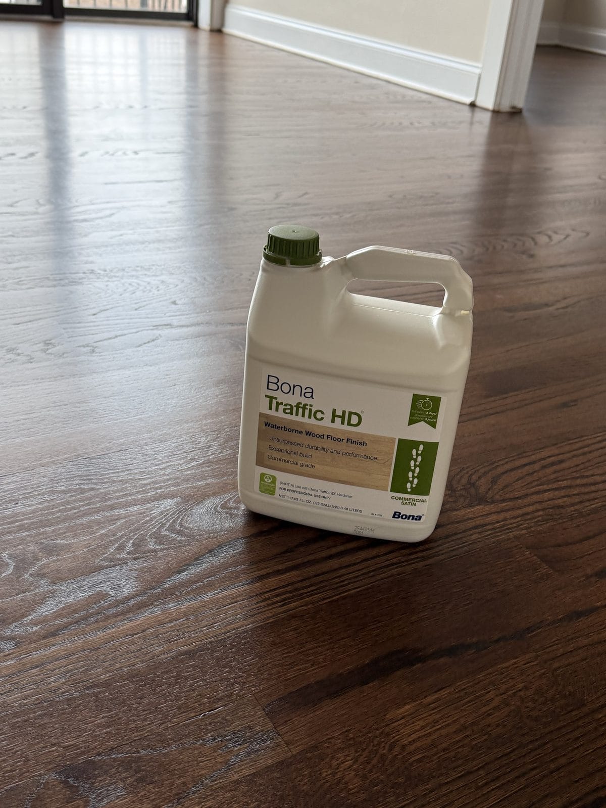 Bona Traffic HD waterborne commercial-grade finish on a freshly refinished dark hardwood floor in Chicago